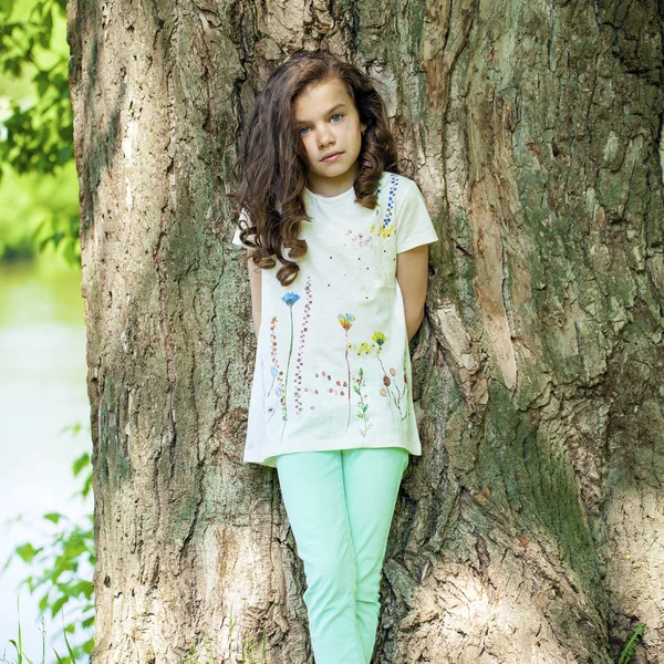 Portrait of a beautiful young little girl — Stock Photo, Image