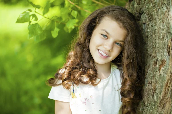 Portrait of a beautiful young little girl — Stock Photo, Image