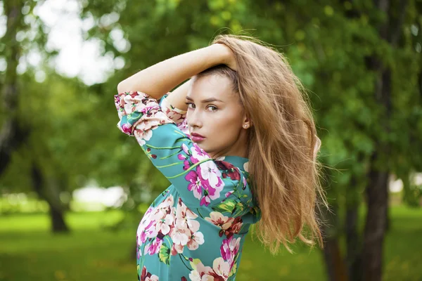 Young brunette woman in white skirt — Stock Photo, Image