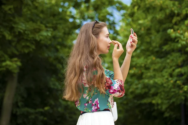 Assistant lipstick beautiful young brunette woman close up — Stock Photo, Image