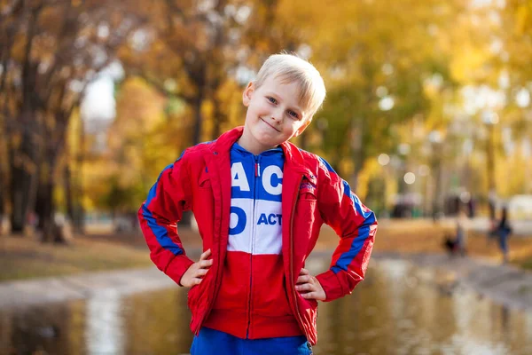 Portrait Little Boy Red Tracksuit Posing Background Autumn Park — Stock Photo, Image