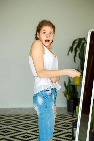Young Beautiful Girl Measures Her Parameters — Stock Photo, Image