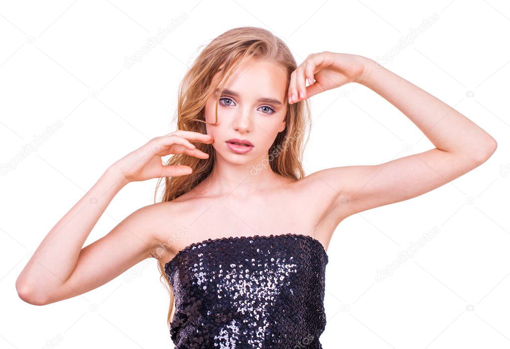 Close-up portrait of young blonde girl on isolated white background