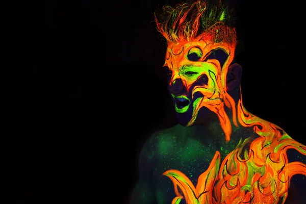Arte corporal brillando en luz ultravioleta —  Fotos de Stock