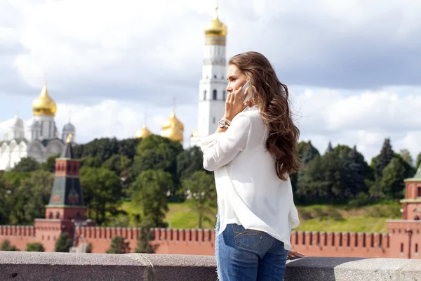 Happy beautiful girl calling by phone — Stock Photo, Image