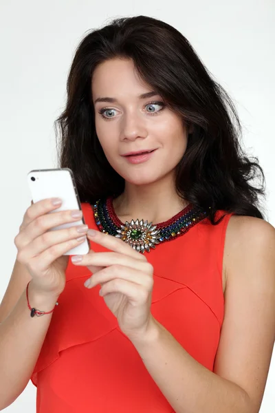 Young woman in the hands of mobile phone — Stock Photo, Image