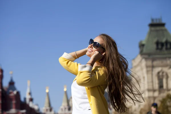 Happy beautiful girl calling by phone — Stock Photo, Image