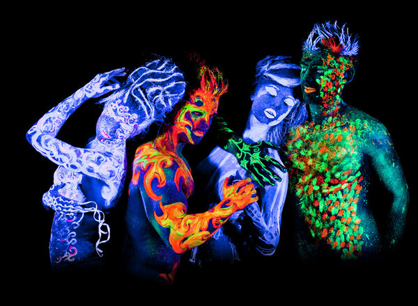 Four - Body art glowing in ultraviolet light 