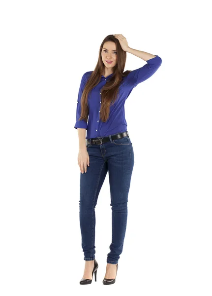 Retrato de una hermosa mujer en jeans azules y camisa azul —  Fotos de Stock