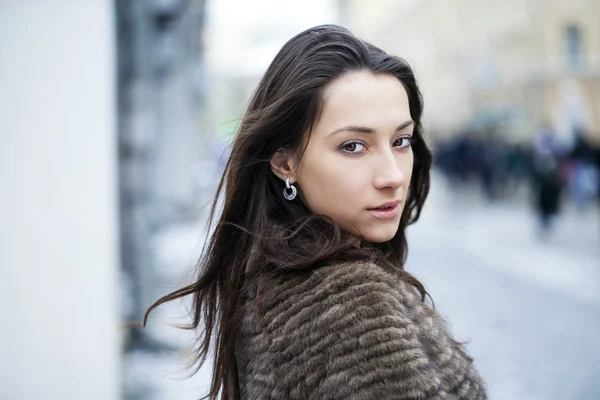 Young beautiful woman in stylish mink coat Stock Photo