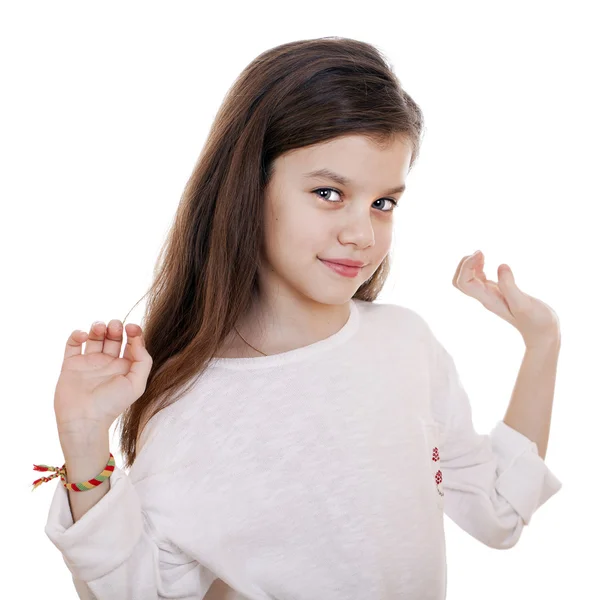 Retrato de una niña encantadora sonriendo a la cámara — Foto de Stock