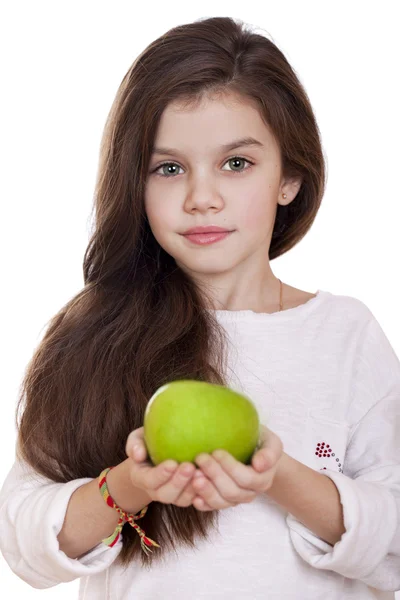 Portrait of a beautiful little girl holding a green apple — Stock Photo, Image
