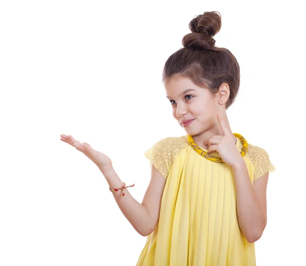 Beautiful youth little girl presenting copy space Royalty Free Stock Images