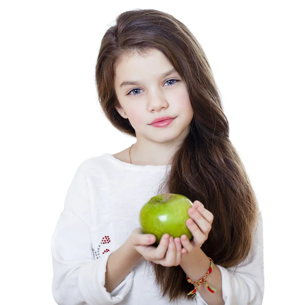 Portrait of a beautiful little girl holding a green apple — Stock Photo, Image