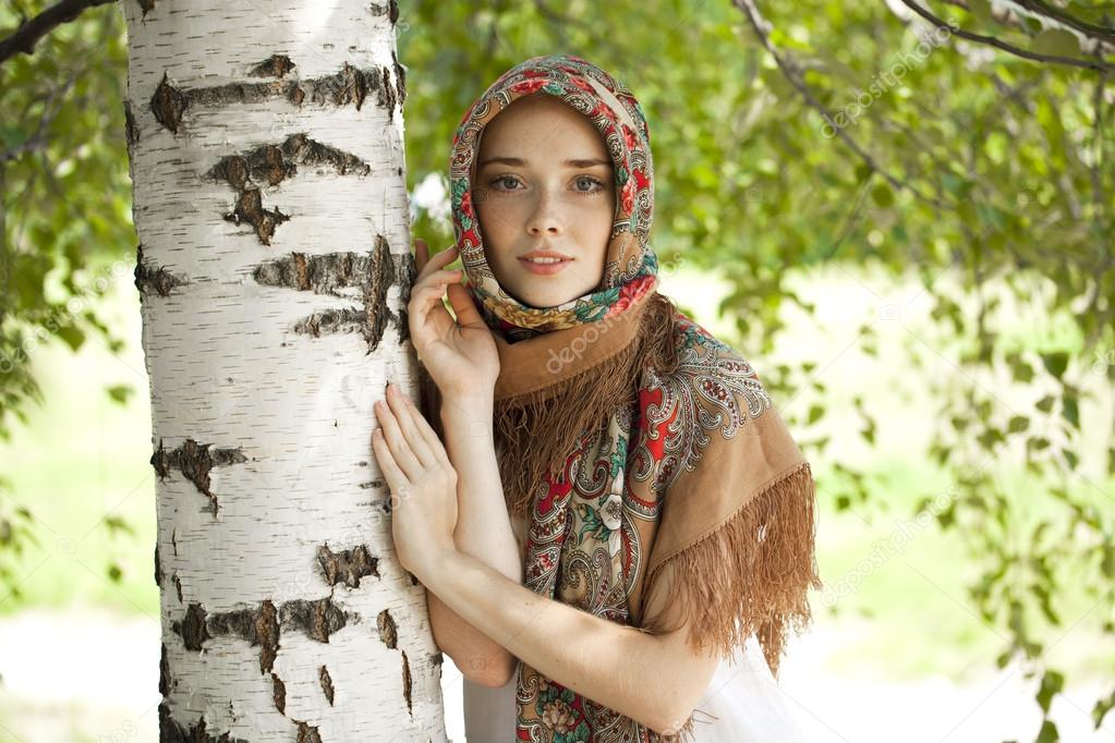 Beauty woman in the national patterned scarf