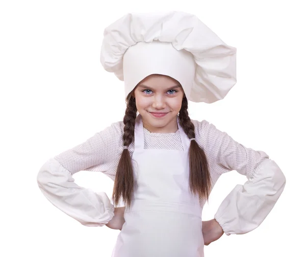 Cooking and people concept - smiling little girl in cook hat — Stock Photo, Image