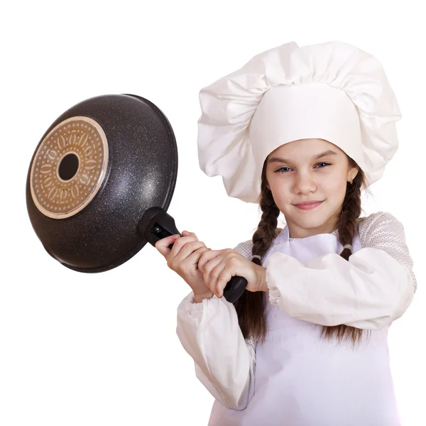 Tava ile aşçı şapkalı küçük kız gülümseyerek — Stok fotoğraf