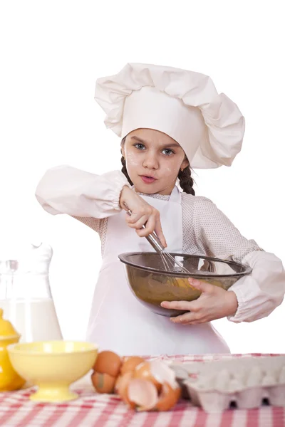 Matlagning och människor koncept - leende liten flicka i cook mössa — Stockfoto