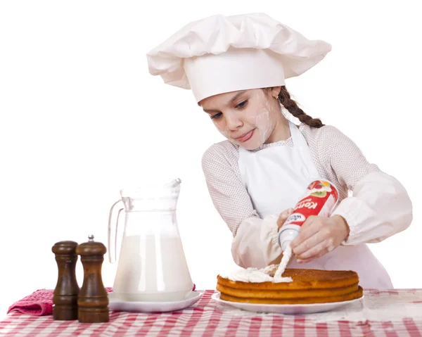 Yemek ve insanlar kavramı - aşçı şapkalı küçük kız gülümseyerek — Stok fotoğraf