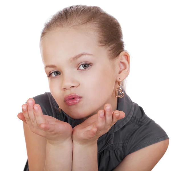 Blonde little Girl Blowing a Kiss, isolated on white background — Stock Photo, Image