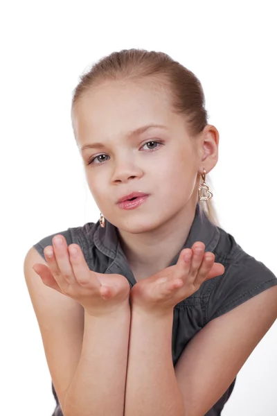 Blonde little Girl Blowing a Kiss, isolated on white background — Stock Photo, Image