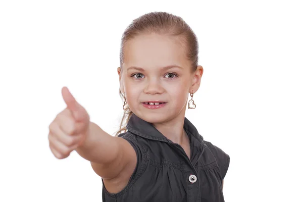 Niña está mostrando el pulgar hacia arriba gesto usando ambas manos — Foto de Stock