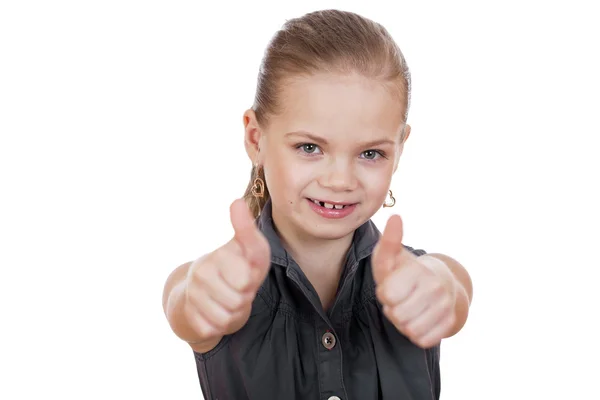 Niña está mostrando el pulgar hacia arriba gesto usando ambas manos — Foto de Stock