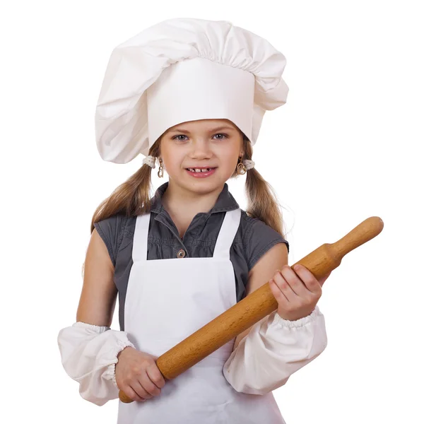 Cute little girl baking on kitchen and shows rolling-pin, isolated on a white background — Stock Photo, Image
