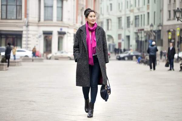 Young beautiful asian woman in stylish gray coat — Stock Photo, Image