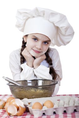 Beyaz bir önlük, küçük kız kalenin yumurta ile tatili.