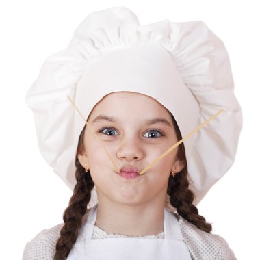Yemek ve insanlar kavramı - aşçı şapkalı küçük kız gülümseyerek 