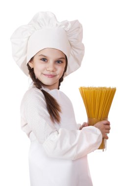 Yemek ve insanlar kavramı - aşçı şapkalı küçük kız gülümseyerek 