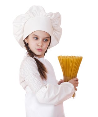 Yemek ve insanlar kavramı - aşçı şapkalı küçük kız gülümseyerek 