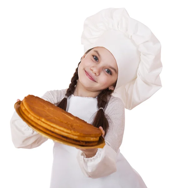 Концепция кулинарии и людей - улыбающаяся маленькая девочка в поваренной шляпе — стоковое фото