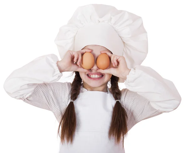 Retrato de uma menina em um avental branco segurando dois frango e — Fotografia de Stock