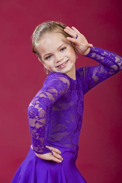 Portrait of a charming blonde little girl looking at camera — Stock Photo, Image