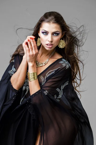 Portrait of the young sexy woman in black tunic Arabic — Stock Photo, Image