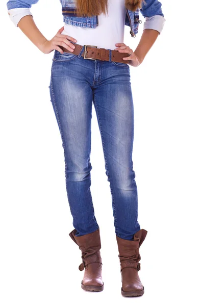 Front view of a standing woman model wearing denim with brown bo — Stock Photo, Image