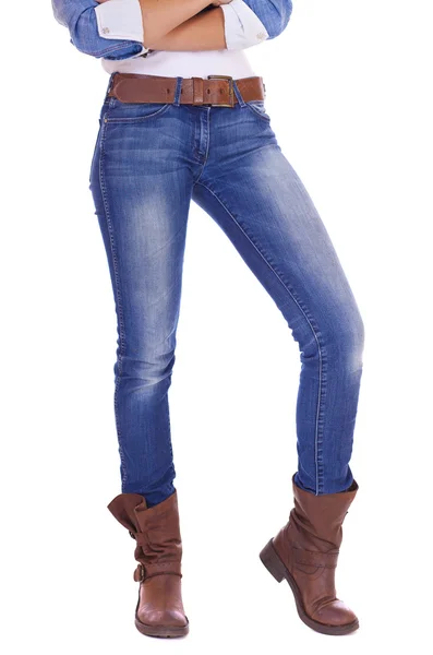 Front view of a standing woman model wearing denim with brown bo — Stock Photo, Image