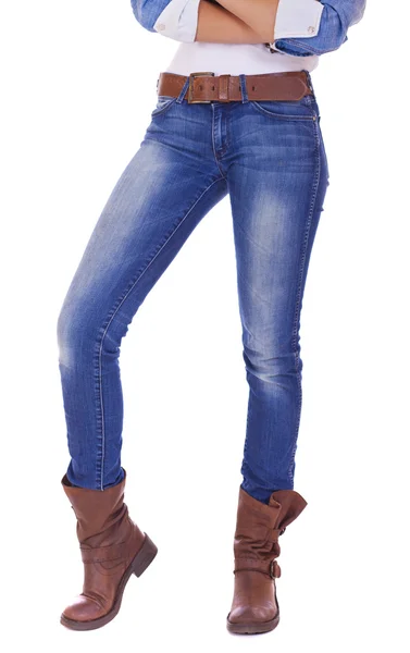 Front view of a standing woman model wearing denim with brown bo — Stock Photo, Image