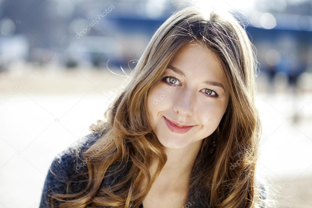 Portrait close up of young beautiful girl