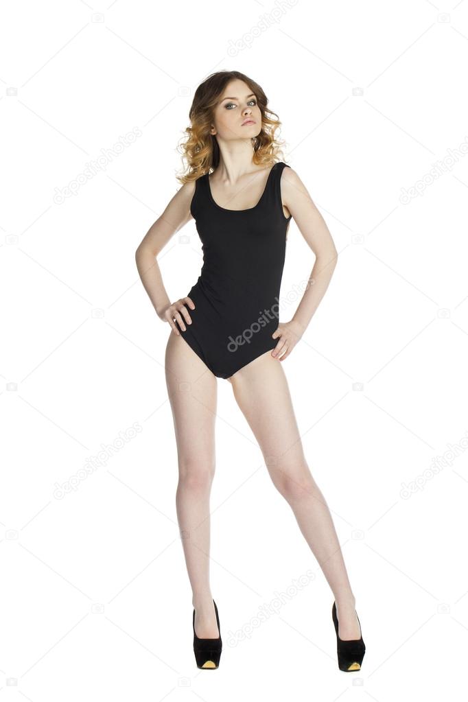 Model Tests, Young slim woman posing in black leotard