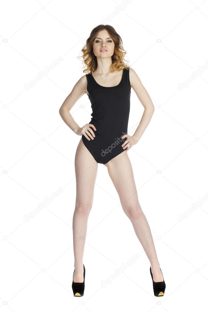 Model Tests, Young slim woman posing in black leotard