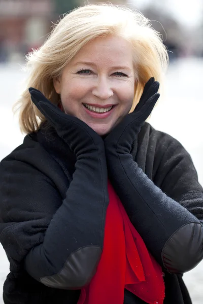 Happy portrait of an elderly blonde woman — Stock Photo, Image