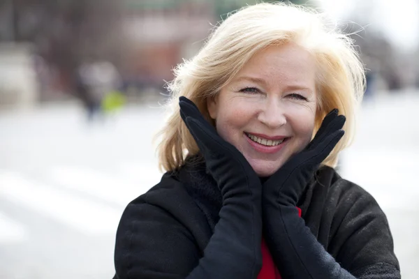 Happy portrait of an elderly blonde woman — Stock Photo, Image