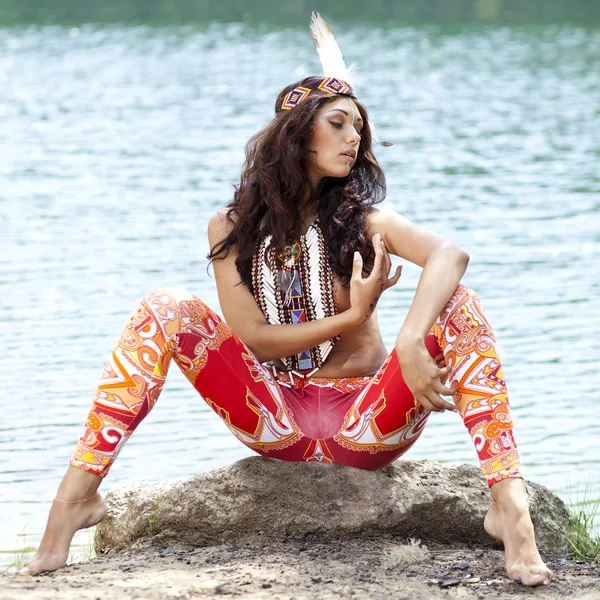 Young woman in costume of American Indian — Stock Photo, Image