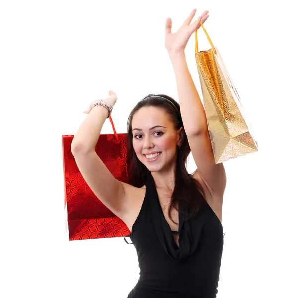 Jovem morena feliz com sacos de compras coloridos em sexy dr — Fotografia de Stock