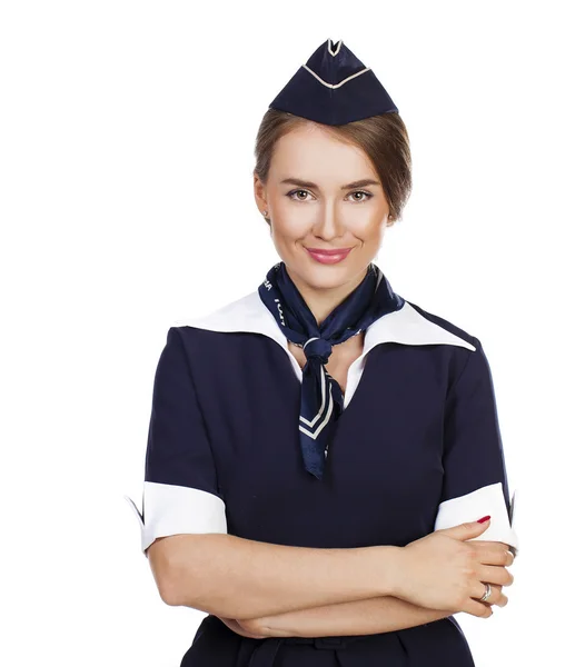 Mooie lachende stewardess geïsoleerd op een witte achtergrond — Stockfoto