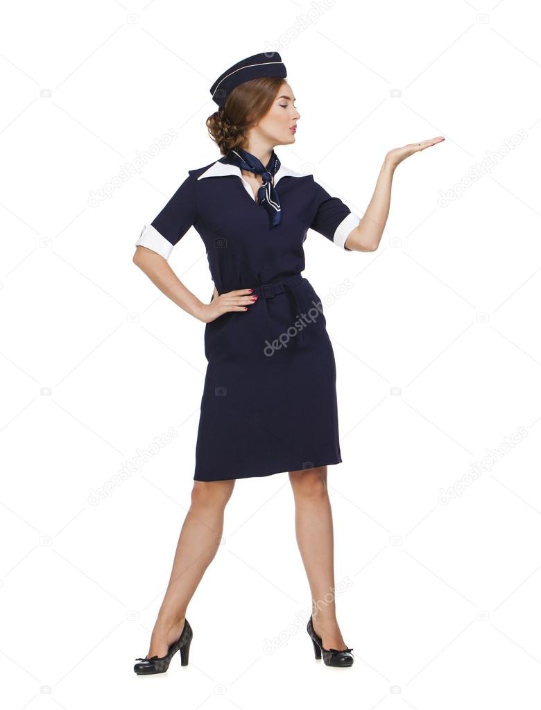 Beautiful smiling stewardess isolated on a white background