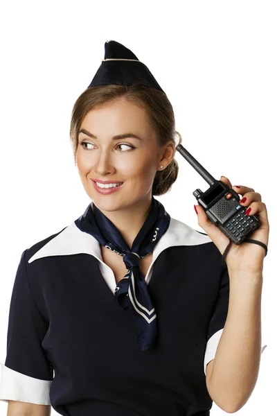 Beautiful smiling stewardess with cb radio — Stock Photo, Image